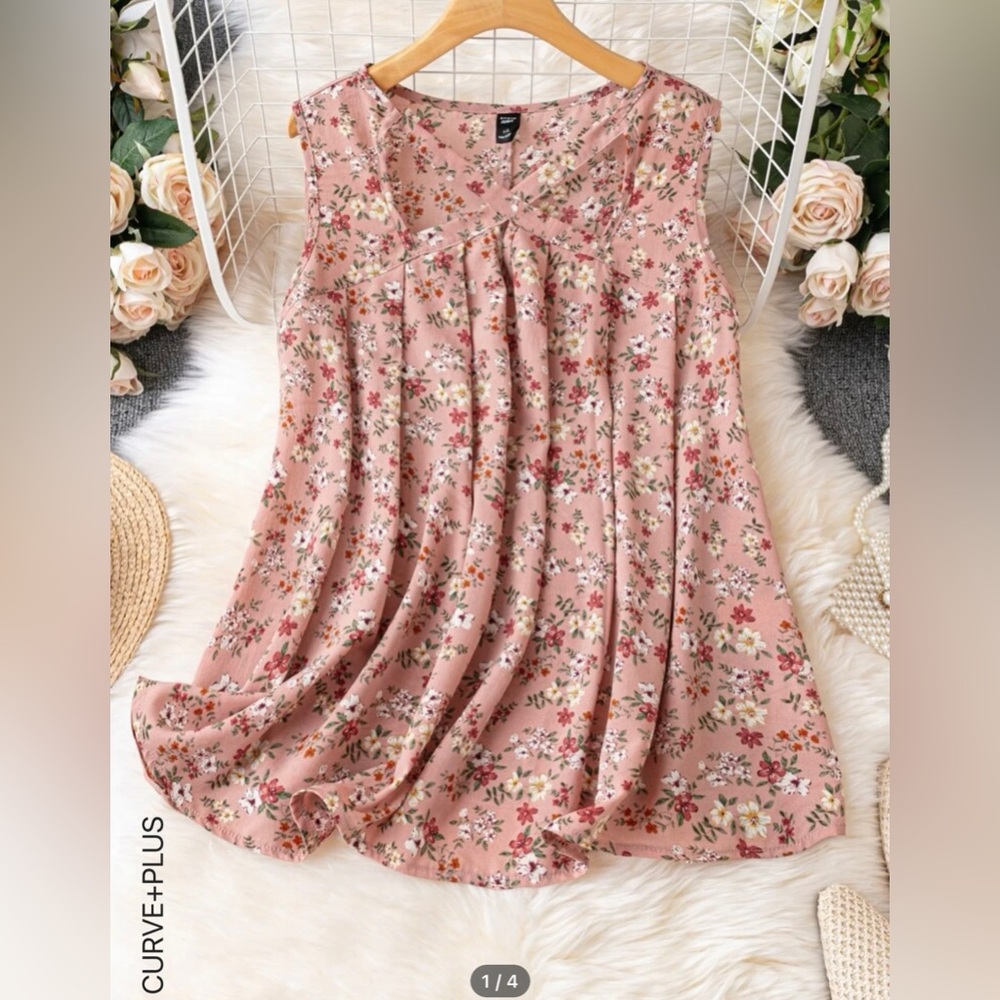 Pink floral sleeveless blouse